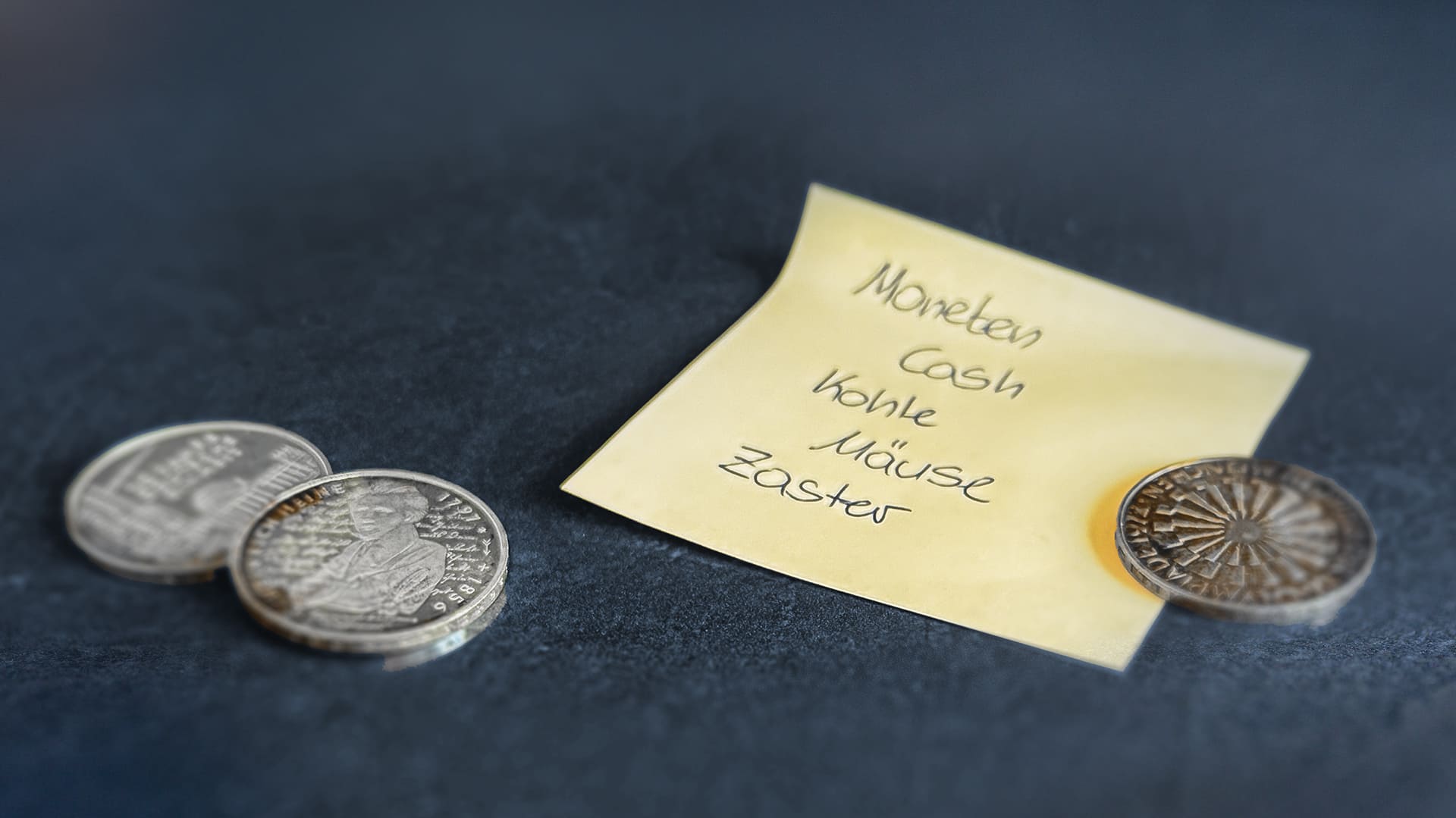 Foto mit dem Zettel - Ausdrücke des Geldes Foto_Ausdruecke_des_Geldes